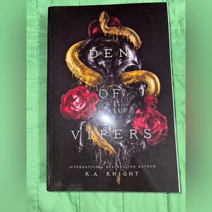 Den of Vipers Book with Skull and Roses Cover